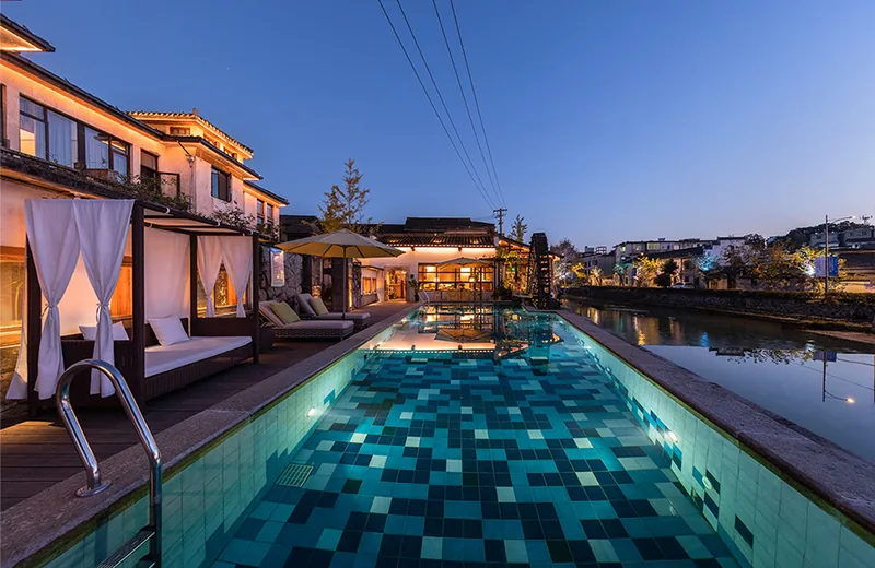 The riverside pool at Heiduo Baishao in Yixian at dusk
